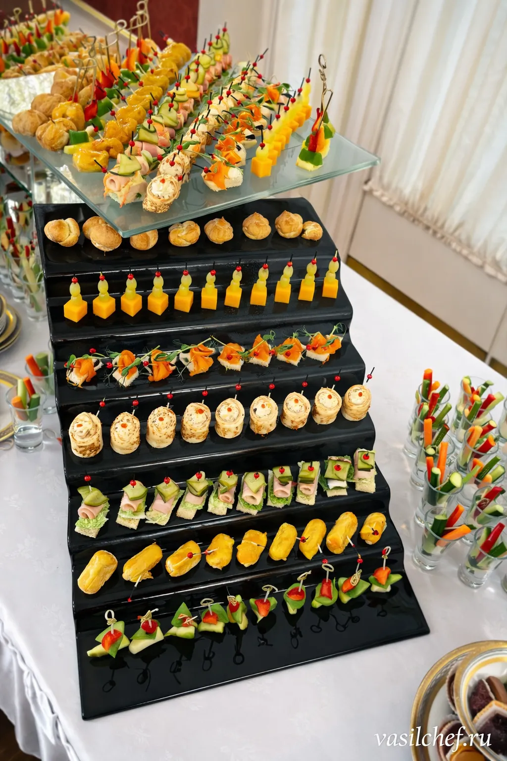 Tiered canapé presentation for a reception